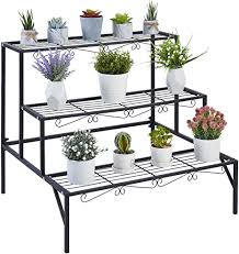 Decorative metal scrolled design looks great and offer good strength. 3 Tier Metal Plant Stand Metal Plant Step Ladder Shelf Flower Pot Holder Indoor Outdoor Decorative Plant Rack Ladder Shelving Unit For Home Garden Patio Balcony 69x58x59cm Black Amazon Co Uk Garden Outdoors