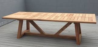 outdoor dining table by dereva design