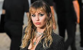 miley cyrus debuts modern mullet and
