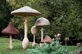 tall wooden carved toadstools garden