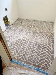 install herringbone brick floor tile