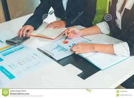 Credit Officer Team Working And Analysis Loan Data Chart In