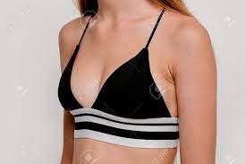 Slim Girl, Small Breasts Teenage Girl In Black Swimsuit Stock Photo,  Picture and Royalty Free Image. Image 174580165.