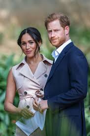 Prince harry, duke of sussex kisses his wife meghan, duchess of sussex as they leave from st. Prince Harry Writes About Better Future For Archie In Open Letter
