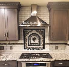 Just a like a beautifully painted feature wall in any other room. 21 Best Behind Stove Tile Ideas Kitchen Backsplash Designs Kitchen Tiles Backsplash Kitchen Backsplash