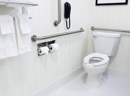 Add handicap bathroom products like handrails, grip bars, slip proof mats, and remove cabinets under the sink. 5 Common Ada Bathroom Compliance Mistakes Buildings