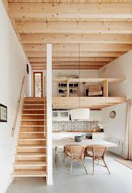 Metallic mezzanine with wooden floor, easy to install with no need of works. Open Plan Living Space With Exposed Wood Structure Wooden Staircase And Mezzanine Floor Love The Tili Tiny House Design Tiny House Living Tiny House Interior