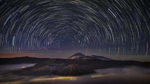 star trail in the night sky wallpaper