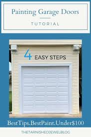 Learn how to paint a light color over a previously painted dark wall. Painting Garage Doors Tutorial Thetarnishedjewelblog