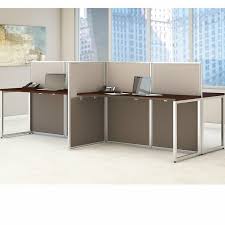 The back side of the desk has 3 display compartments, two open and one with a swing down door. Double Sided Desk Wayfair