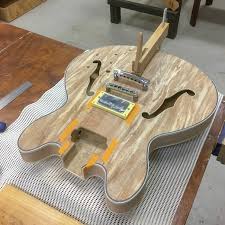 building your own guitar the benefits