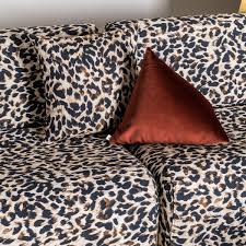 wood base sofa leopard rotondo the