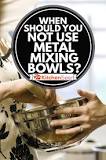 When should you not use a metal mixing bowl?