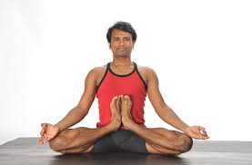pm modi congratulates yoga guru on twitter