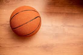 Basketball Against Hardwood Floor Shot