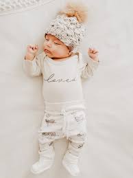Incorporating stylish neutral colours like pale greys and pastel yellows, our range of unisex baby clothes are perfect for the littlest member of your family. Organic Baby Clothes Gender Neutral Baby Clothes Otter Baby Etsy