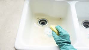 how to clean a white enamel sink to