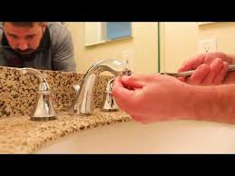to clean a faucet aerator or showerhead