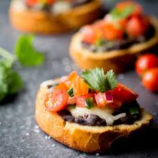Give thanks and celebrate the day in a state rich in cultural diversity, eclectic food, and delightful people. Mini Bean And Cheese Molletes Christmas Recipes Appetizers Thanksgiving Appetizer Recipes Christmas Appetizers