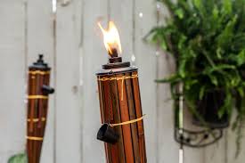 how to use tiki torches to light up the