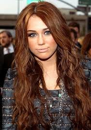 She's always on the edge, and this untamed and distinct trait of her personality also reflects on her haircuts. Miley Cirus Red Hair Miley Cyrus Hair Evolution Pictures Better Off Red Usmagazine Design Hair Styles Miley Cyrus Hair Hair Evolution