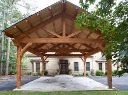 This carport plan features a generous amount of storage space. Houston Timber Frame Traditional Garage And Shed Houston Texas Timber Frames Carport Designs Timber Framing Carport Plans