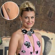 Millie Bobby Brown's Tattoos: Photos, Their Meanings Guide