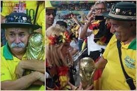 The Sad Brazilian Man Clutching The World Cup Trophy Handed It Over To  gambar png
