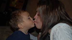 is it okay to kiss your kids on the lips