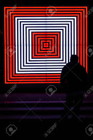 Man Silhouette Looks At A Glowing Target Squares Neon Lights