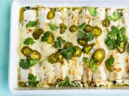 Roll each tortilla, ensuring the filling is distributed the length of the tortilla. Sour Cream Chicken Enchiladas Recipe Myrecipes