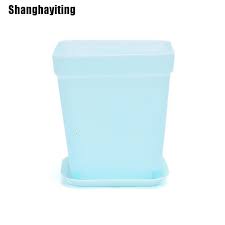 colorful plastic flower pots tray