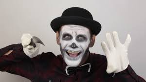 horrible man clown makeup threatens his
