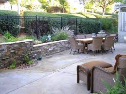 Stained Concrete Patio And Seat Wall