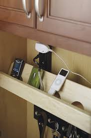 A 12.25 round shelf holds the wireless charging pad and can also be used for extra storage needs. Thomasville Organization Charging Station