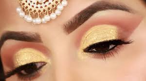 golden glitter bridal eye makeup in