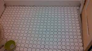 install ceramic tile over a vinyl floor