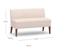 A banquette with furniture, such as these modular banquette benches . Modular Upholstered Banquette Pottery Barn