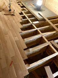 laying hardwood flooring on second