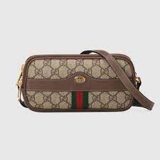 A versatile design originally inspired by mail carriers. Ophidia Mini Gg Bag In Beige Ebony Gg Supreme Canvas A Material With Low Environmental Impact Gucci Women S Crossbod Bags Crossbody Bag Womens Crossbody Bag