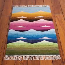 mountain motif wool area rug from peru