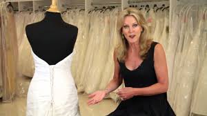 It's cut in a classic silhouette and features a scoop neckline with wide straps which extend into a square back. How To Put A Corset Back In A Wedding Dress Wedding Dresses Bridal Attire Youtube