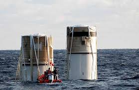 Debris and other objects scrap at the shuttle, leavi. Nasa Discovery S Solid Rocket Boosters In The Ocean