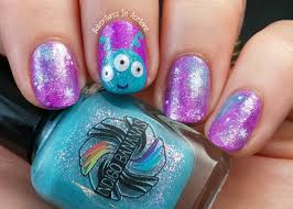 cutesy alien and galaxy nail art