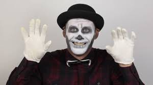 horrible man clown makeup grimaces