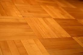 install hardwood floors over parquet
