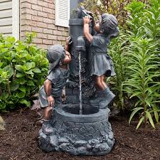 Outdoor Water Fountain With Boy And