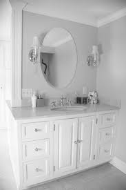 We tried to consider all the trends and styles. White Bathroom Vanities Lowes Luxury Bathroom Oval Mirror Finished In White Color Equipped With White White Vanity Bathroom Elegant Bathroom Bathroom Ideas Uk