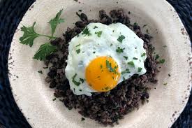 gallo pinto with fried eggs costa