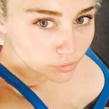 miley cyrus gets weed tattoo on her